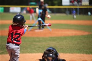 Youth baseball player at bat